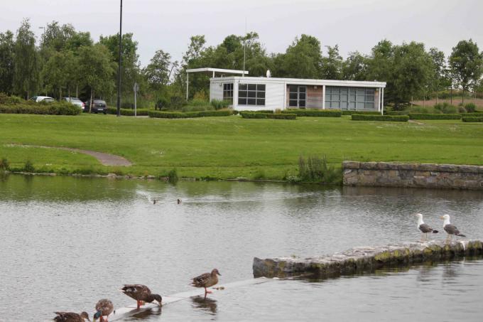 Facility Management Building with lake